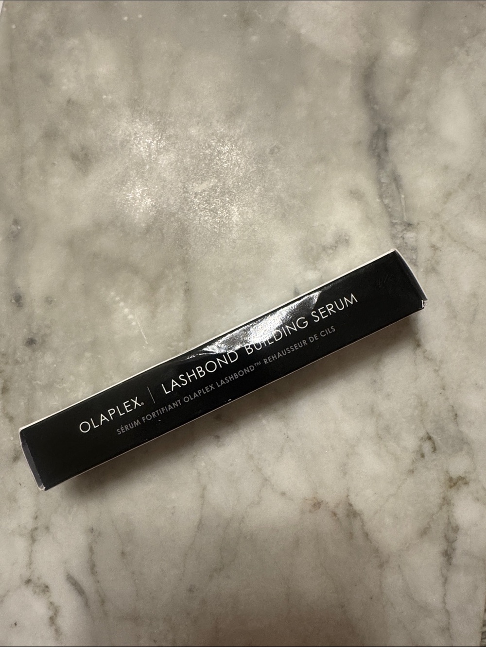 OLAPLEX Lashbond Building Serum — Black Packaging with White Text